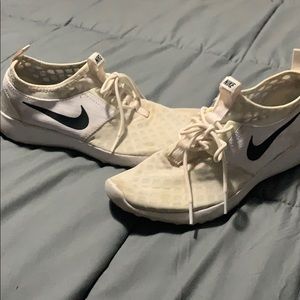 Worn Nike juvenate women’s sneakers